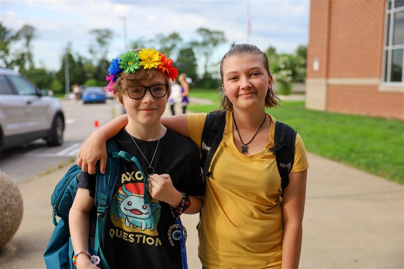 Two boys smile